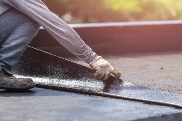 Professional Exterior Waterproofing technician working in Oakdale, NY